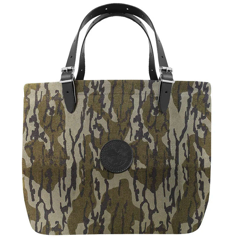 Market Tote in Mossy Oak Bottomland Camo featuring rugged canvas construction and adjustable leather handles, ideal for durable outdoor use by Duluth Pack.