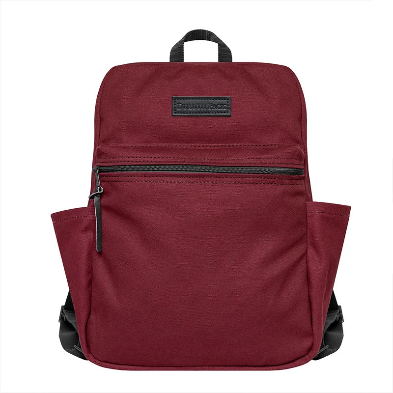NEW Limited Edition Lake Huron Standard Backpack in deep red canvas with leather details, designed for durable outdoor use and everyday rugged performance.