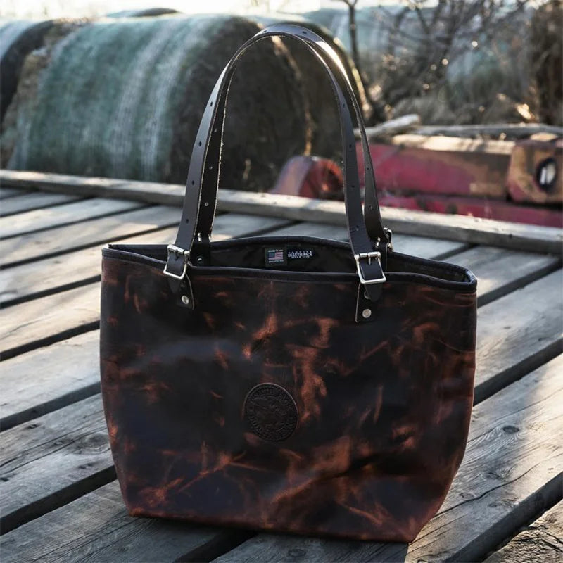 Heritage Leather Market Tote on Farm with Hay Bales