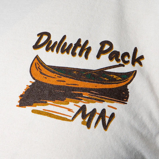 Duluth Pack Canoe Adventure T-Shirt in cappuccino color featuring a stylized canoe graphic and Northern Minnesota theme by LAKESHIRTS, INC.