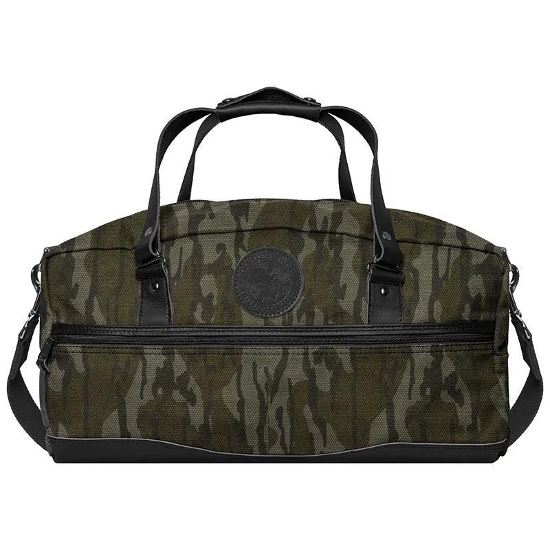 Weekender Duffel in Mossy Oak Bottomland Camo with handcrafted leather bottom, rugged canvas, designed by Duluth Pack for durable outdoor travel and weekend use.