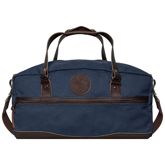 Weekender Duffel in navy with handcrafted leather accents, showcasing rugged outdoor travel gear by Duluth Pack designed for durability and style.