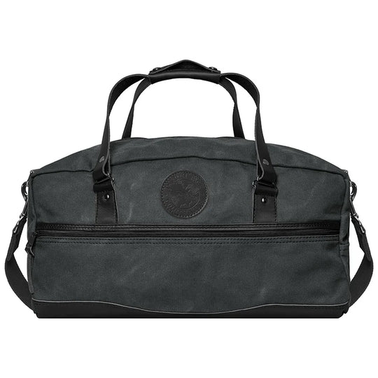 Weekender Duffel in Waxed Grey canvas with handcrafted leather bottom and handles, perfect for rugged outdoor travel by Duluth Pack.