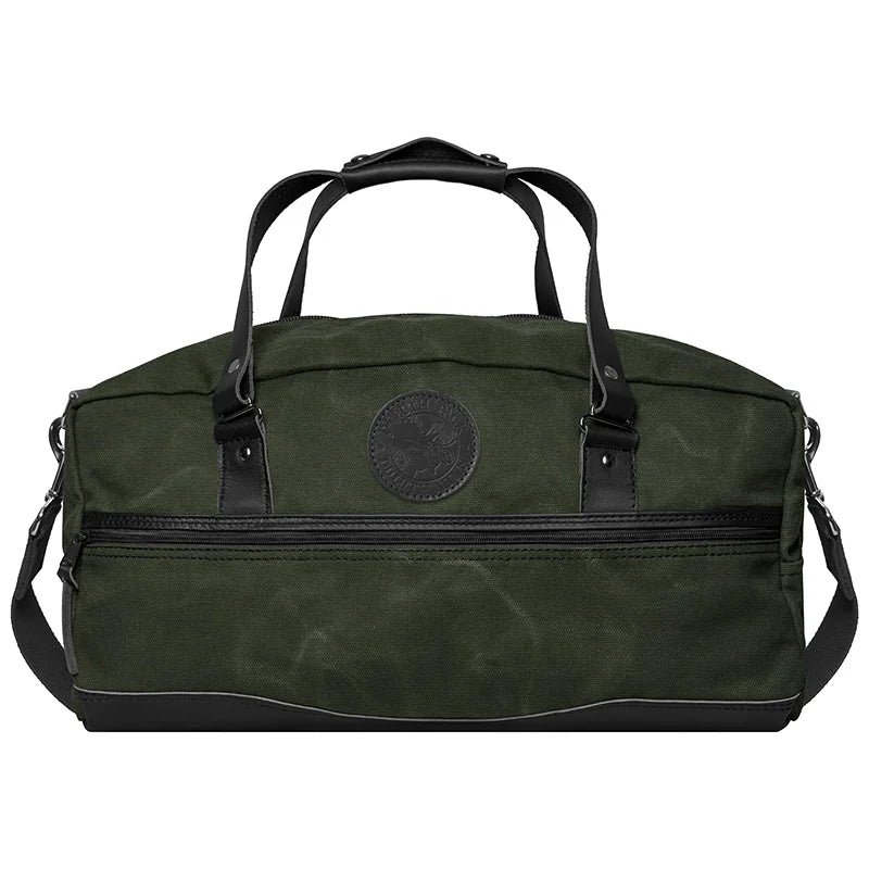 Weekender Duffel in Olive Drab featuring rugged canvas and handcrafted leather bottom, designed by Duluth Pack for durable, long-lasting outdoor use.