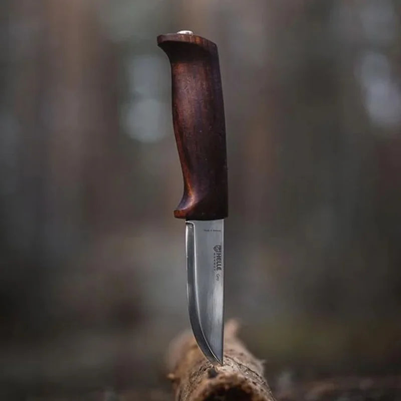 Helle Gro Knife on a piece of wood