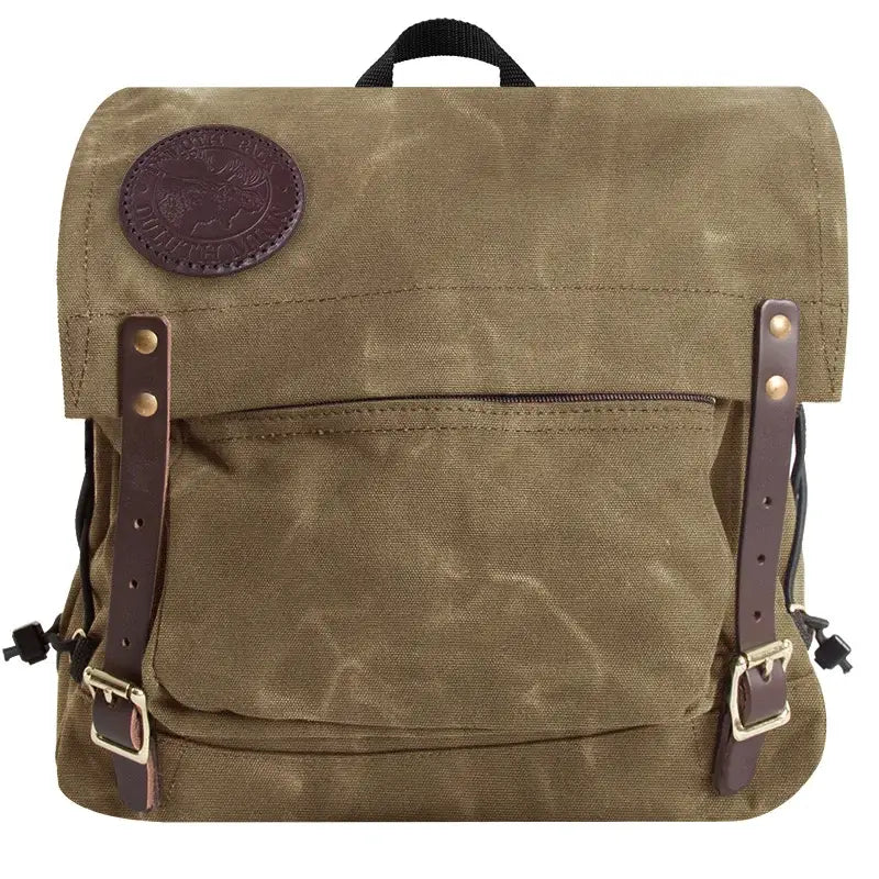 Duluth Pack Portage Pack in waxed khaki with white background