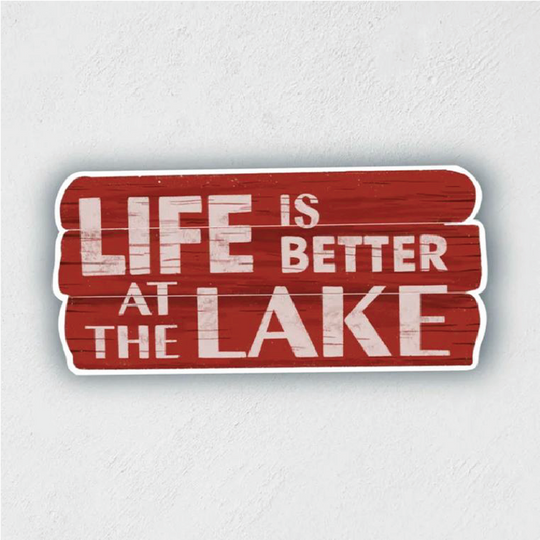 Sticker of a red, wooden sign that says "LIFE IS BETTER AT THE LAKE"