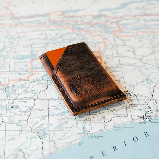 Heritage Leather Card Sleeve on Map Table with cards