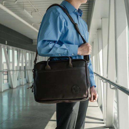Innovator Briefcase Held by Man Over Shoulder